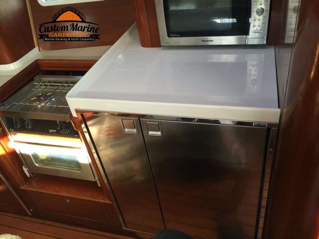 original fridge removal and Custom Fridge install by Custom Marine Carpentry1